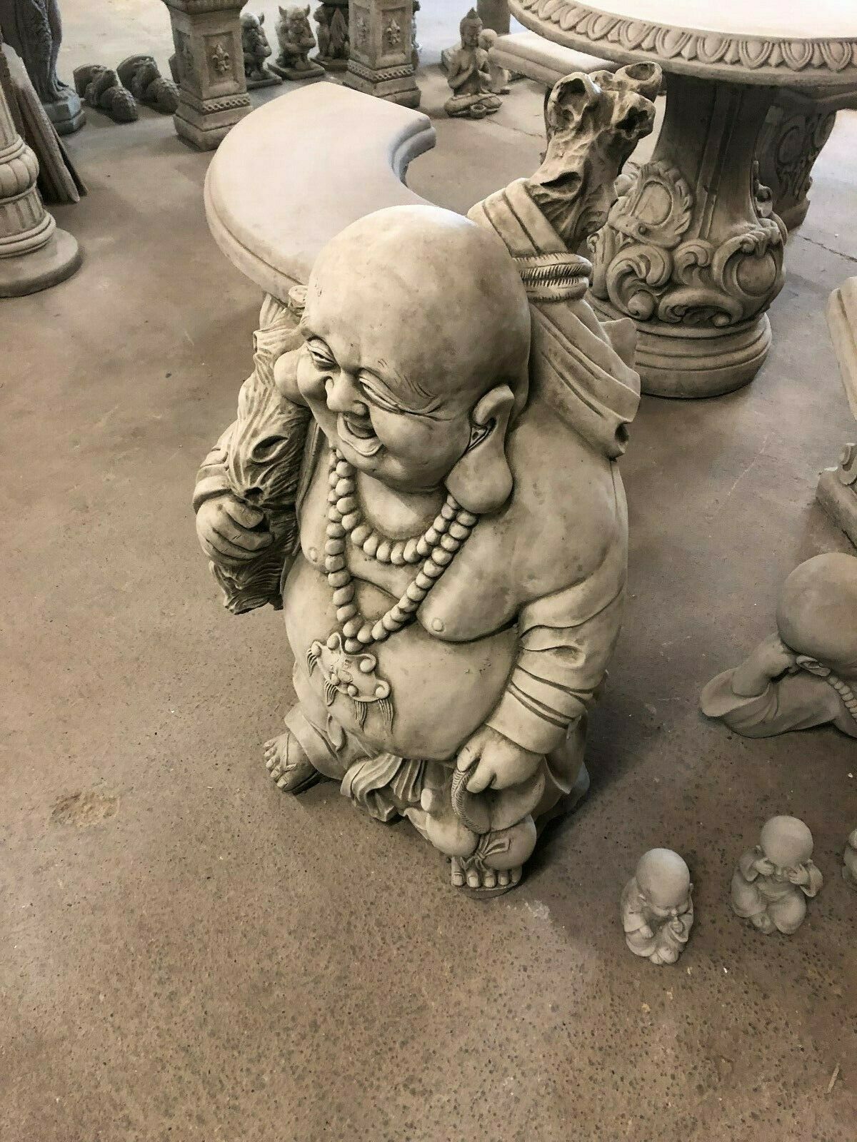 Top view of Stone Laughing Buddha Statue with detailed sack and beads, perfect for indoor zen spaces or outdoor garden decor.