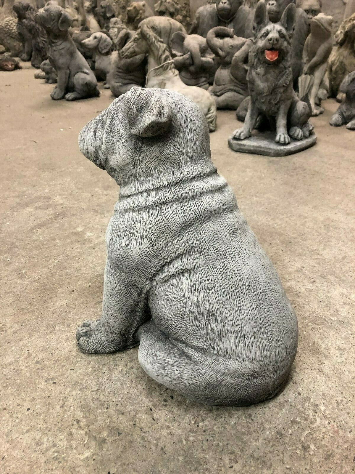 Rear side view of the Durable Bulldog Stone Statue - British Puppy, highlighting lifelike fur texture and solid stone craftsmanship.