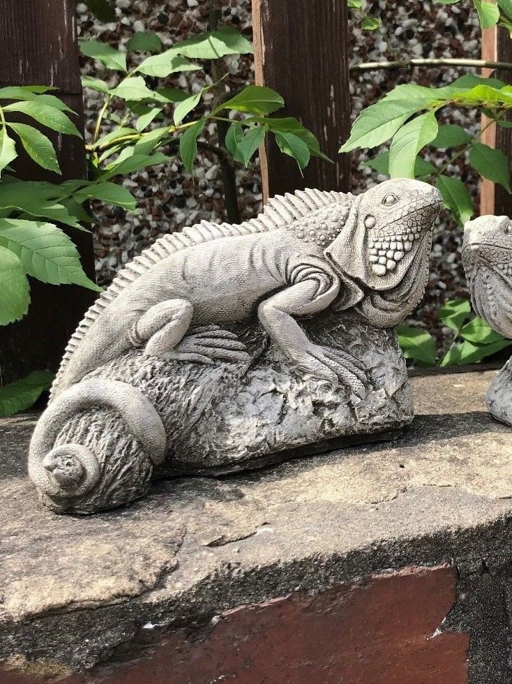 Close-up of a stone iguana garden sculpture with textured detail, part of the Iguana Garden Ornaments - Stone Collection.