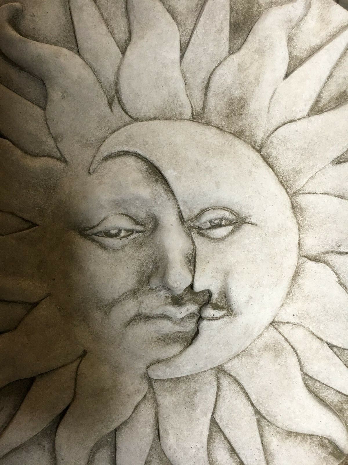 Close-up of sun moon plaque showing intricate carving details, enhancing outdoor wall decor aesthetics.
