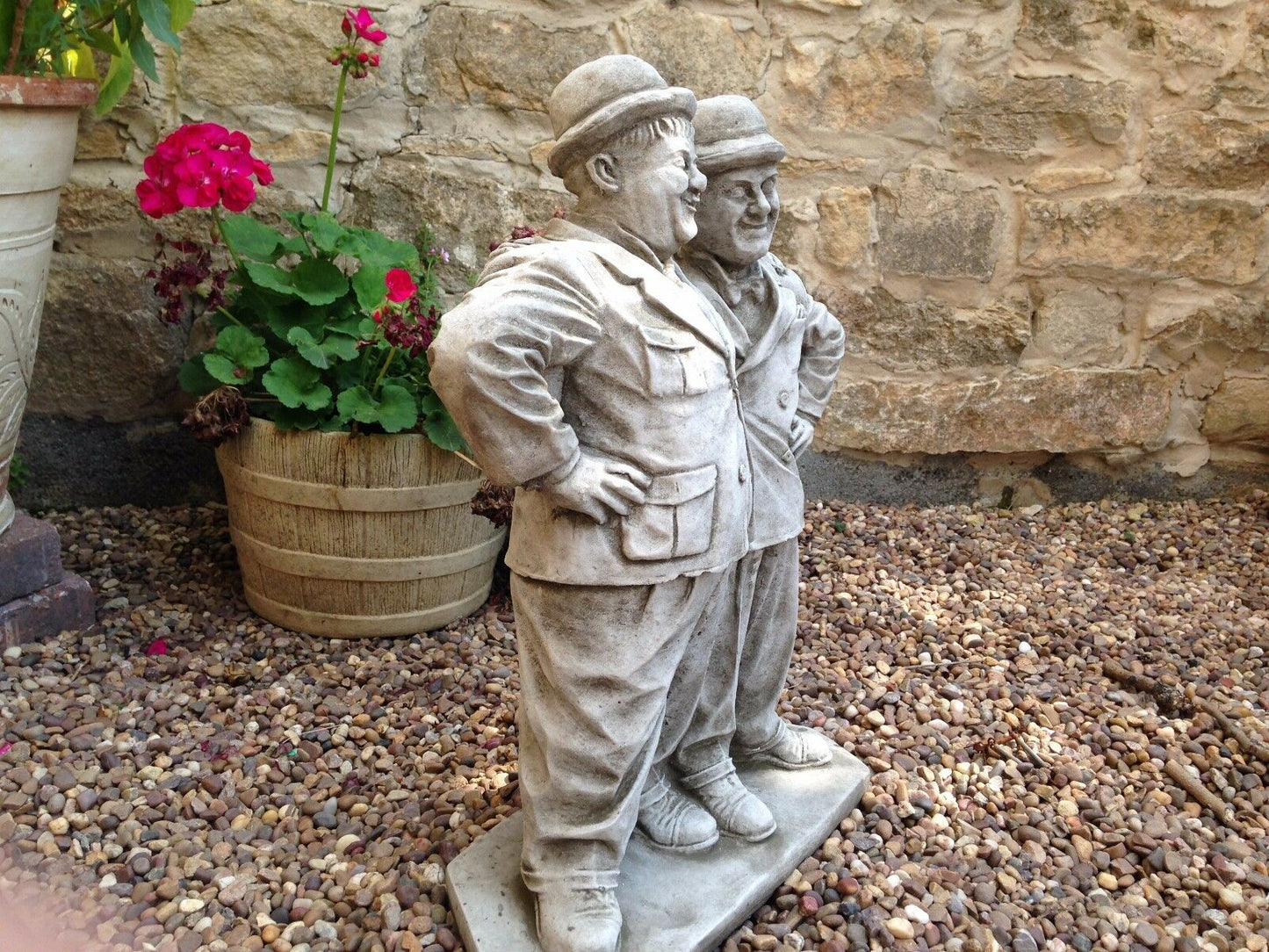 Side angle of Laurel & Hardy garden ornament in stone, showcasing detailed sculpting and ideal for patio or garden display.