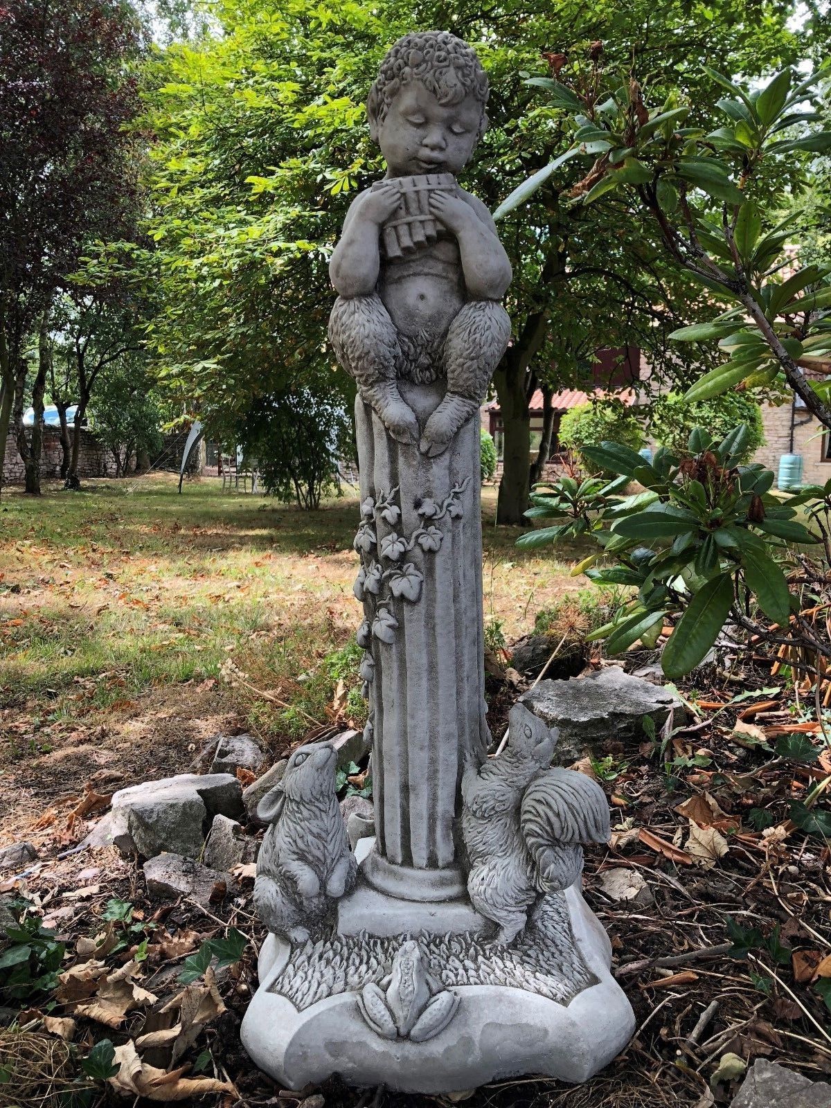 Autumn-themed faun statue with rabbits and ivy details, part of the Stunning Stone Garden Statues - Four Seasons Statues set.
