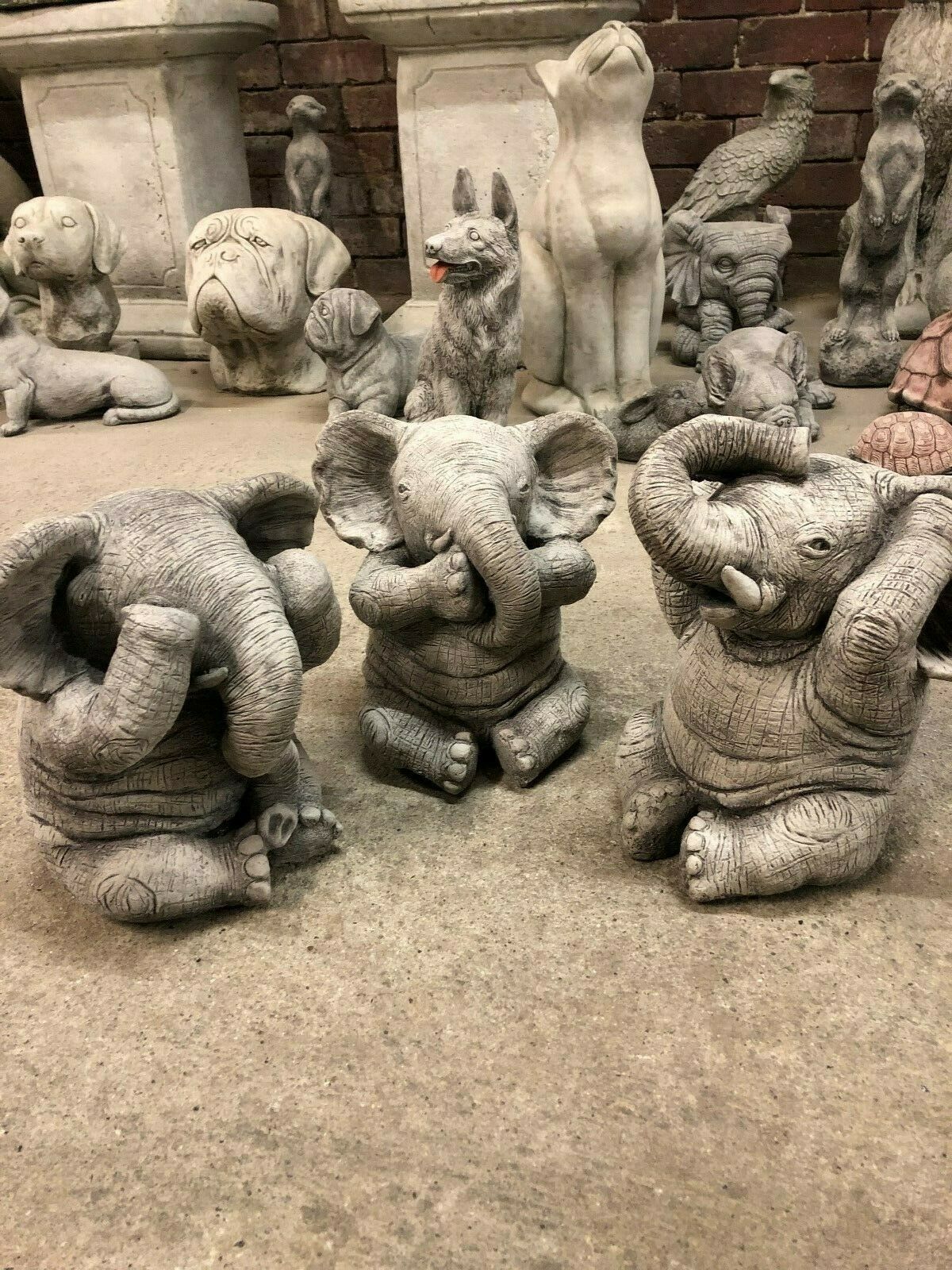 Stone Hear, See & Speak No Evil Elephant Ornaments trio in antique grey finish, ideal for garden or patio decor in home and garden settings.