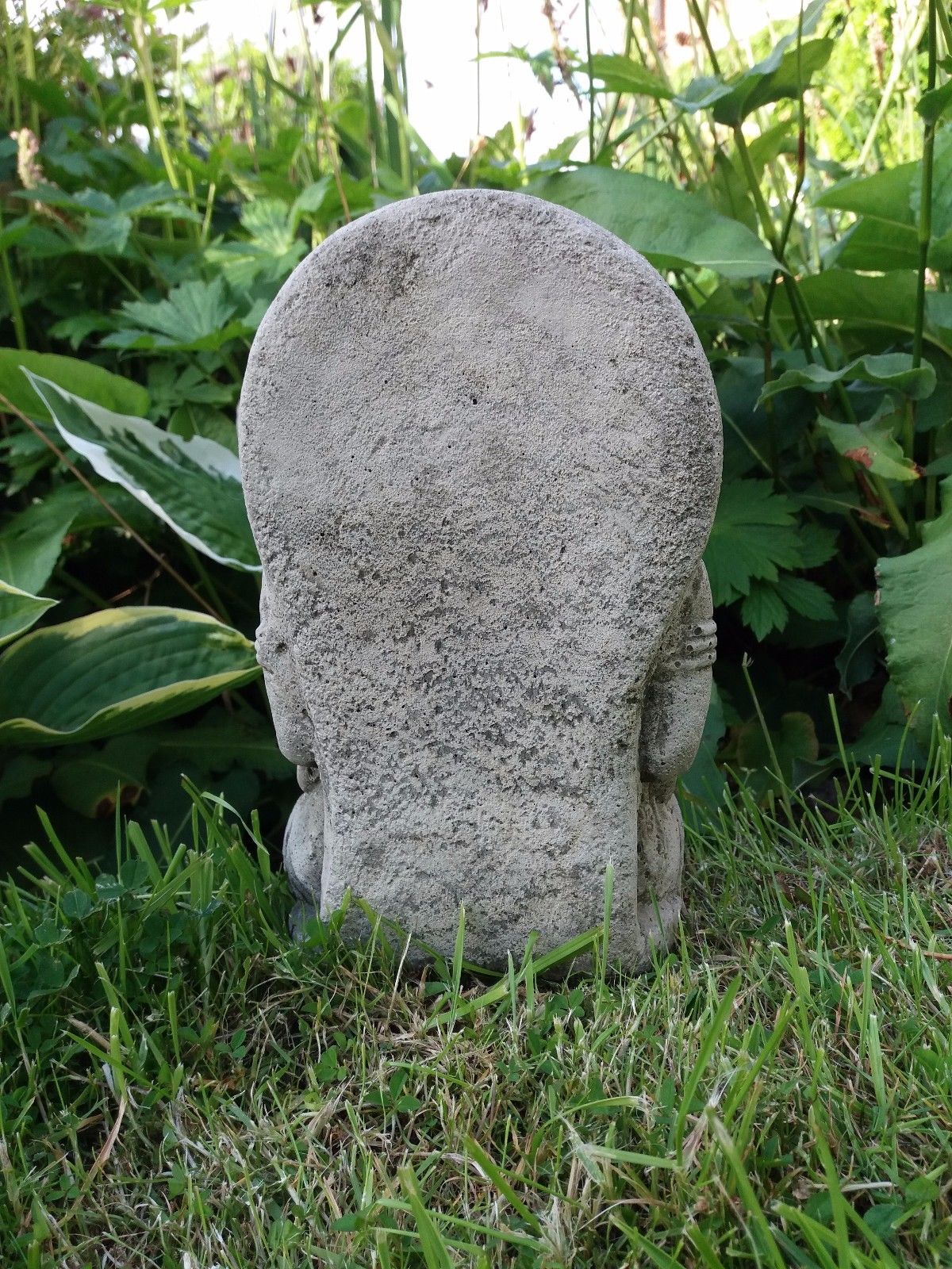 Back view of the Small Stone Ganesh Garden Ornament showing solid limestone texture. Weatherproof and handmade for outdoor use.
