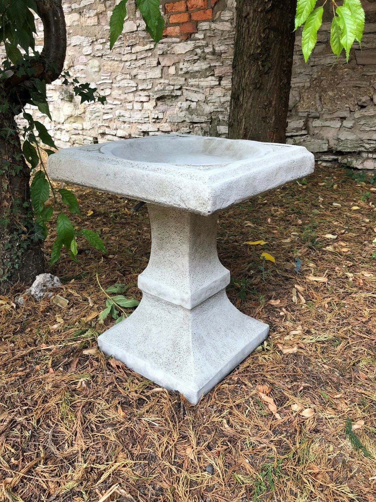 Close-up of Stone Square Bird Bath - Design Sculpture highlighting its handcrafted stone texture and elegant square shape.