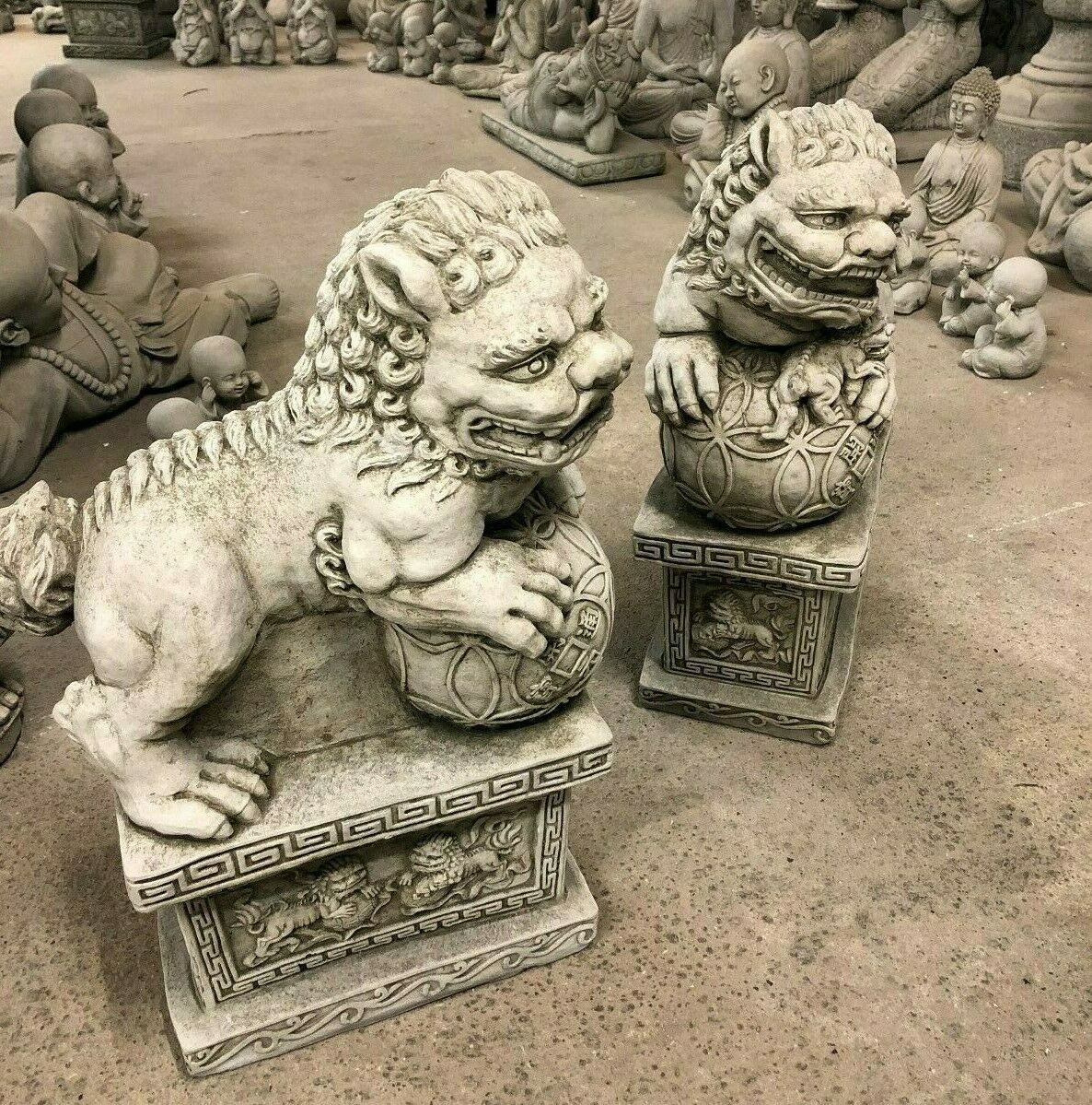 Top view of Foo Dog Statues showing detailed carving and symmetrical design, ideal for outdoor garden or patio ornamentation.