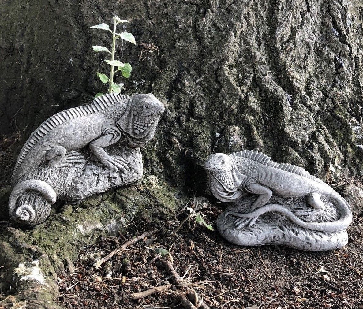 Pair of Iguana Garden Ornaments from the Stone Collection placed at tree base, showcasing lifelike detail and durable limestone for outdoor decor.