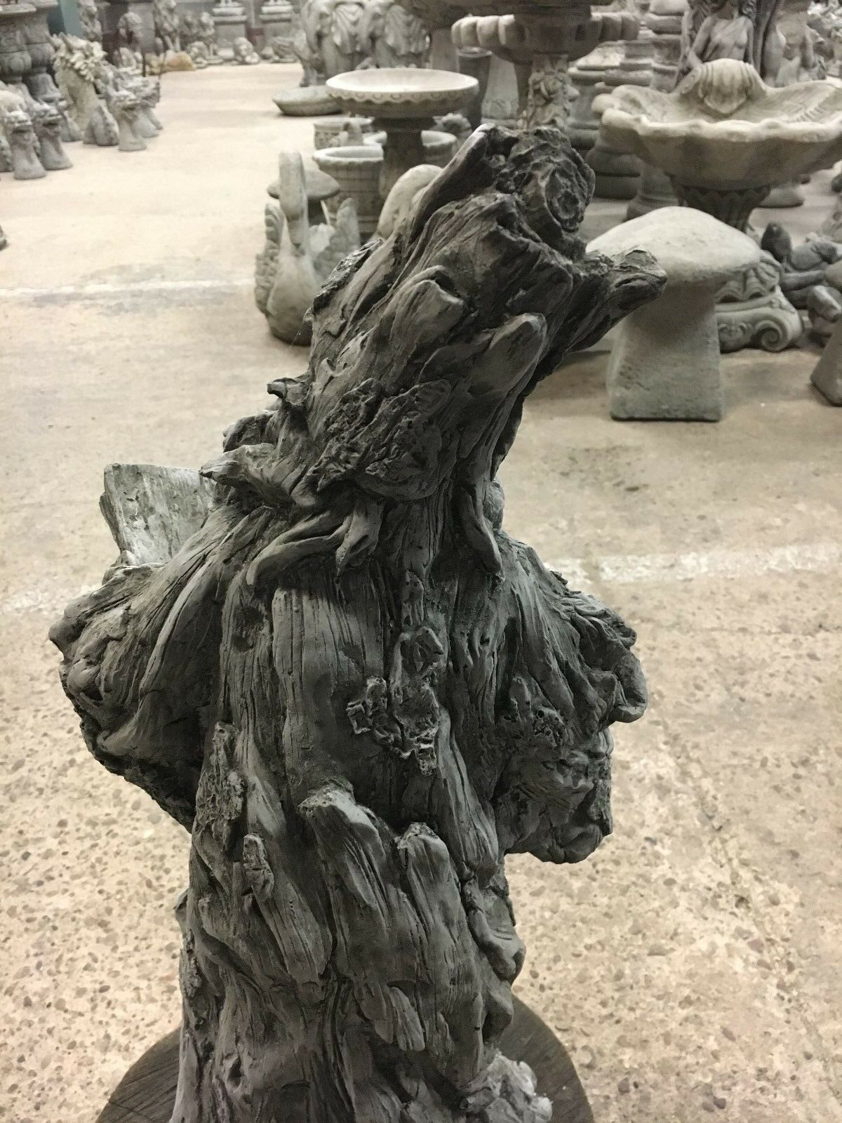 Rear angle of Wizard Garden Statue revealing textured stonework, ideal for fantasy-themed garden landscapes.