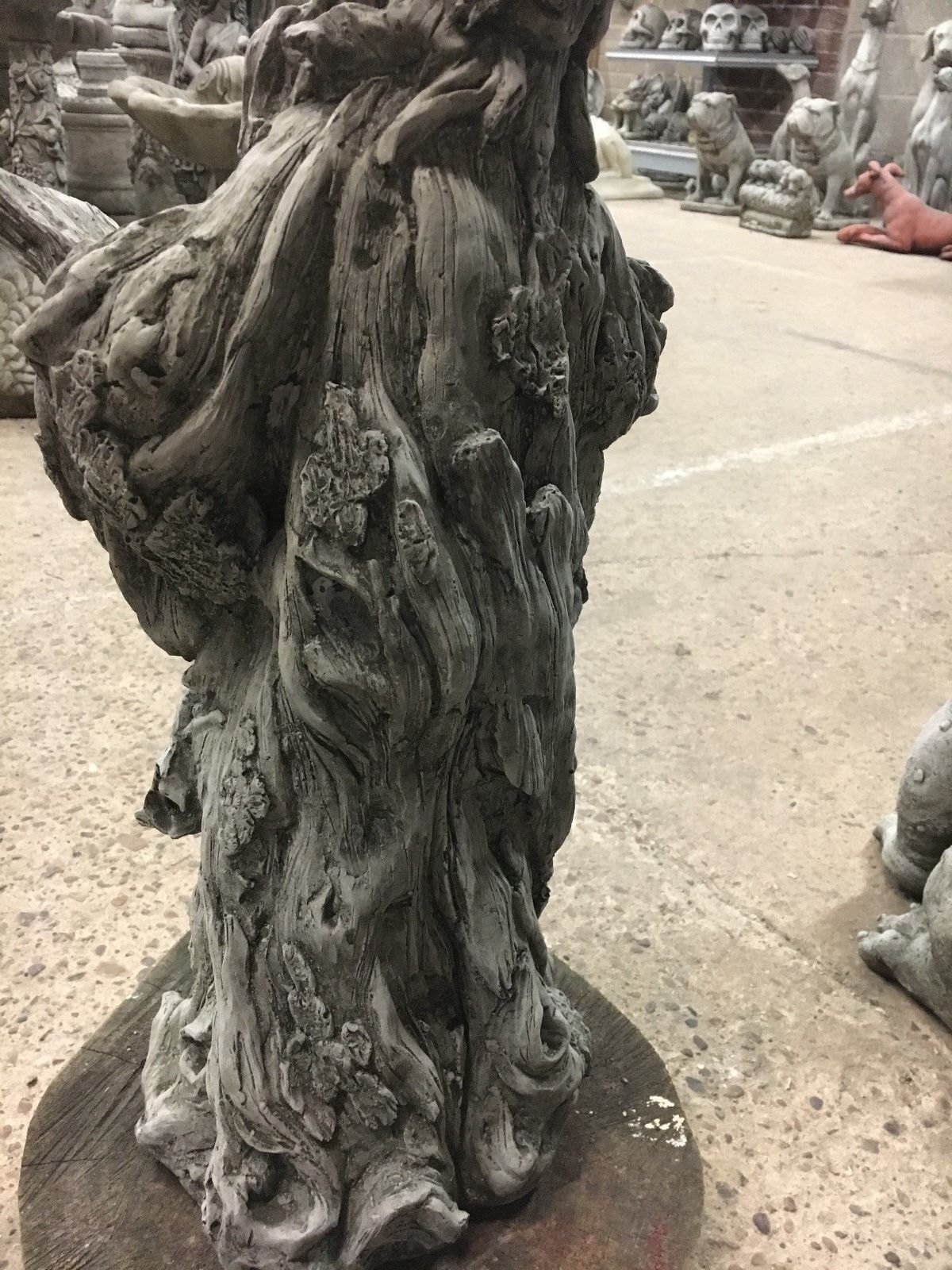 Lower back detail of Wizard Garden Statue, emphasizing naturalistic stone carving and durable garden ornament quality.