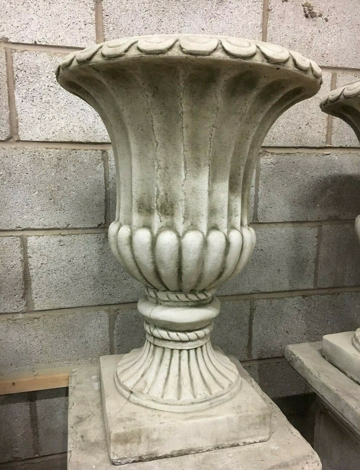 Elegant Georgian Design Stone Urn Planter with classic fluted body and square base, ideal for outdoor garden or patio decoration.