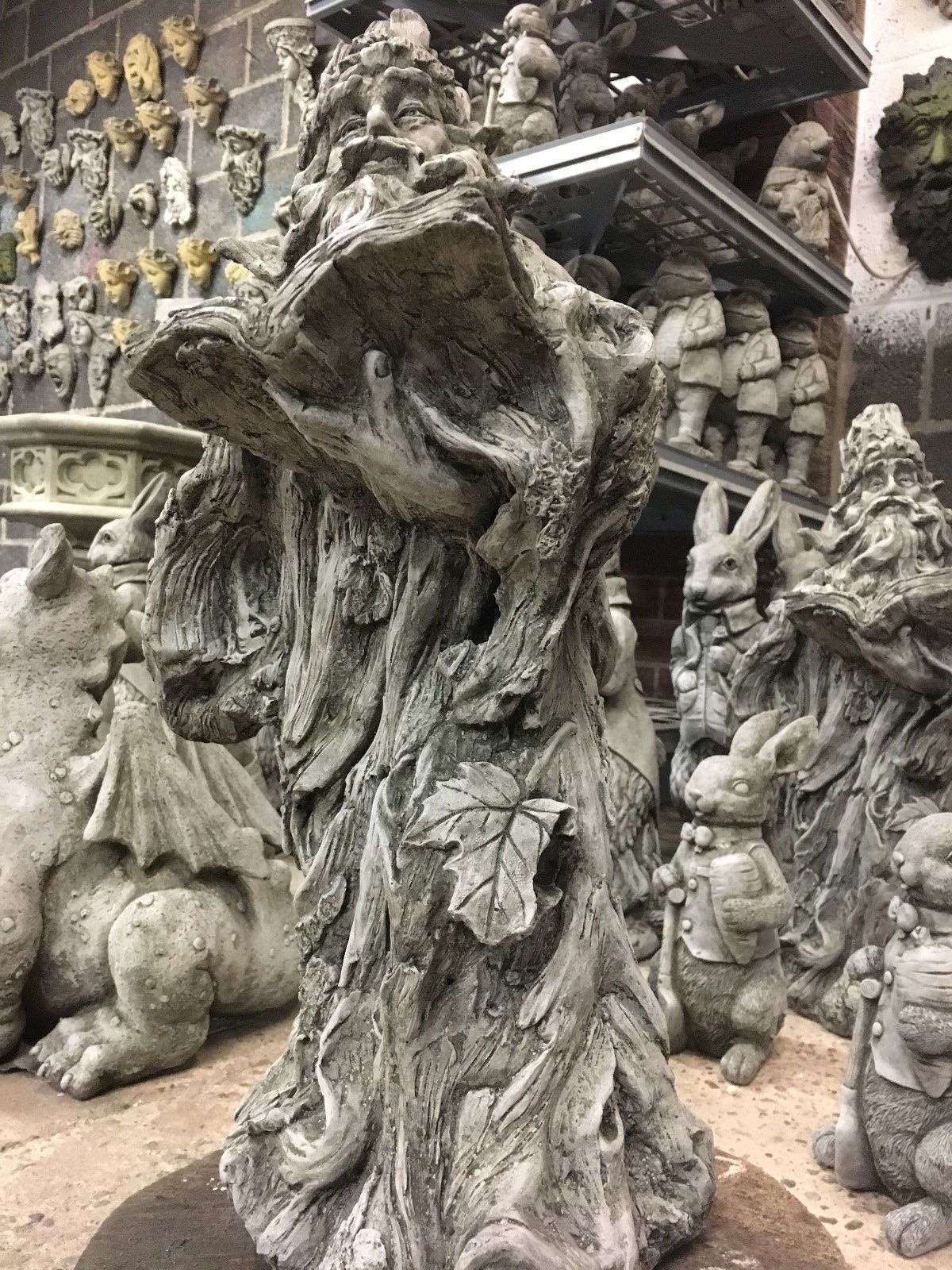 Front angle of Wizard Garden Statue with leaf detail, a magical stone sculpture for lawn or patio decoration.