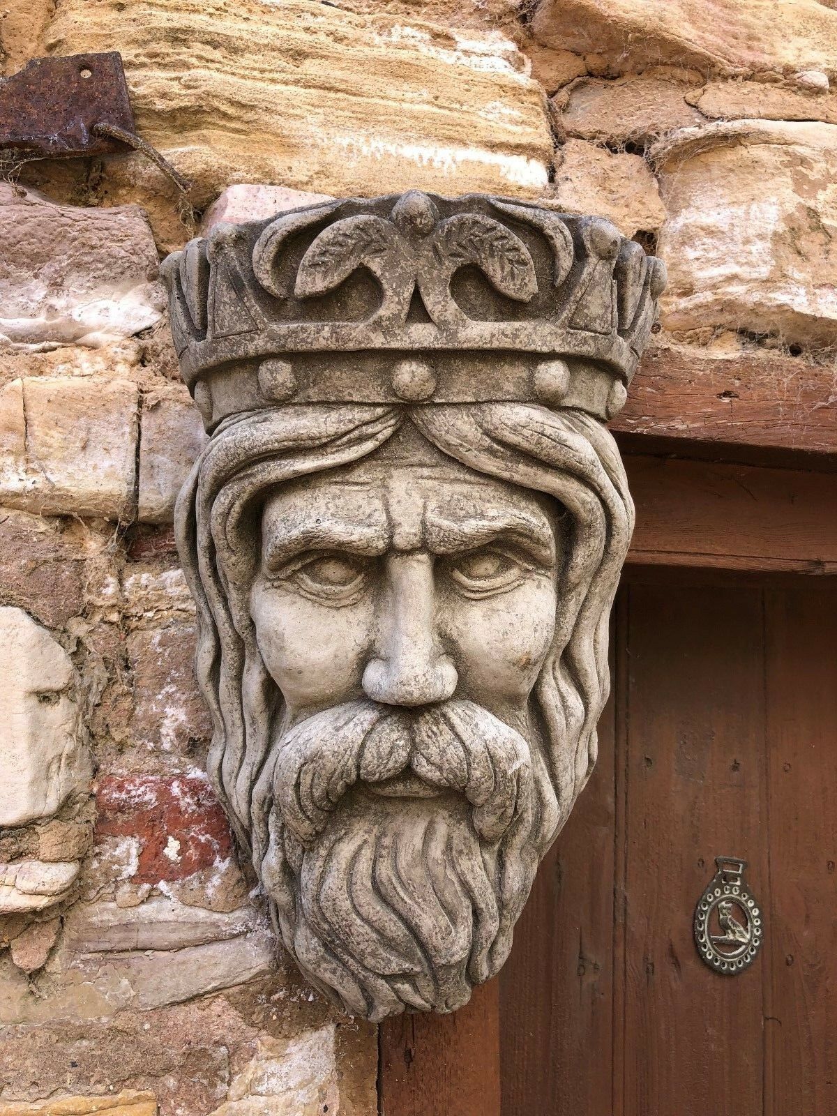 Close-up of King Garden Planter with intricate crown and facial features, perfect for enhancing patio or garden walls.