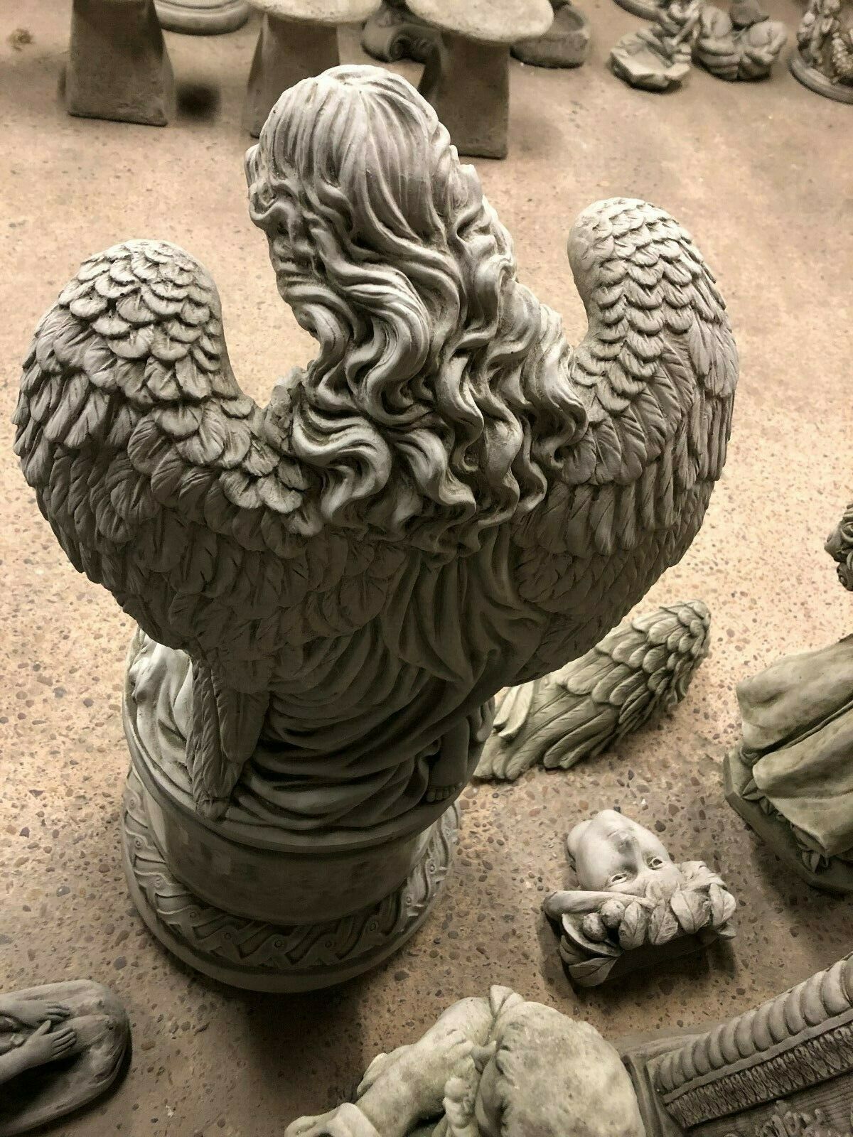 Back view of Angel Garden Pedestal Statue - Stone Finish | Large & Durable. Showcases intricate wing and hair detailing in weather-resistant stone.