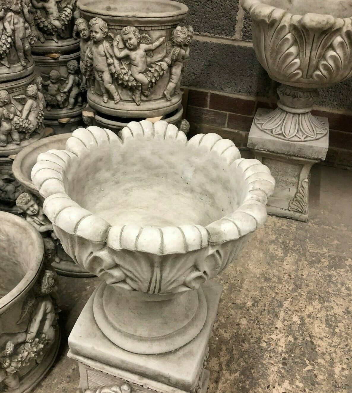 Top view of the Small Tulip Garden Planter showing its deep bowl and scalloped tulip design, ideal for planting flowers.
