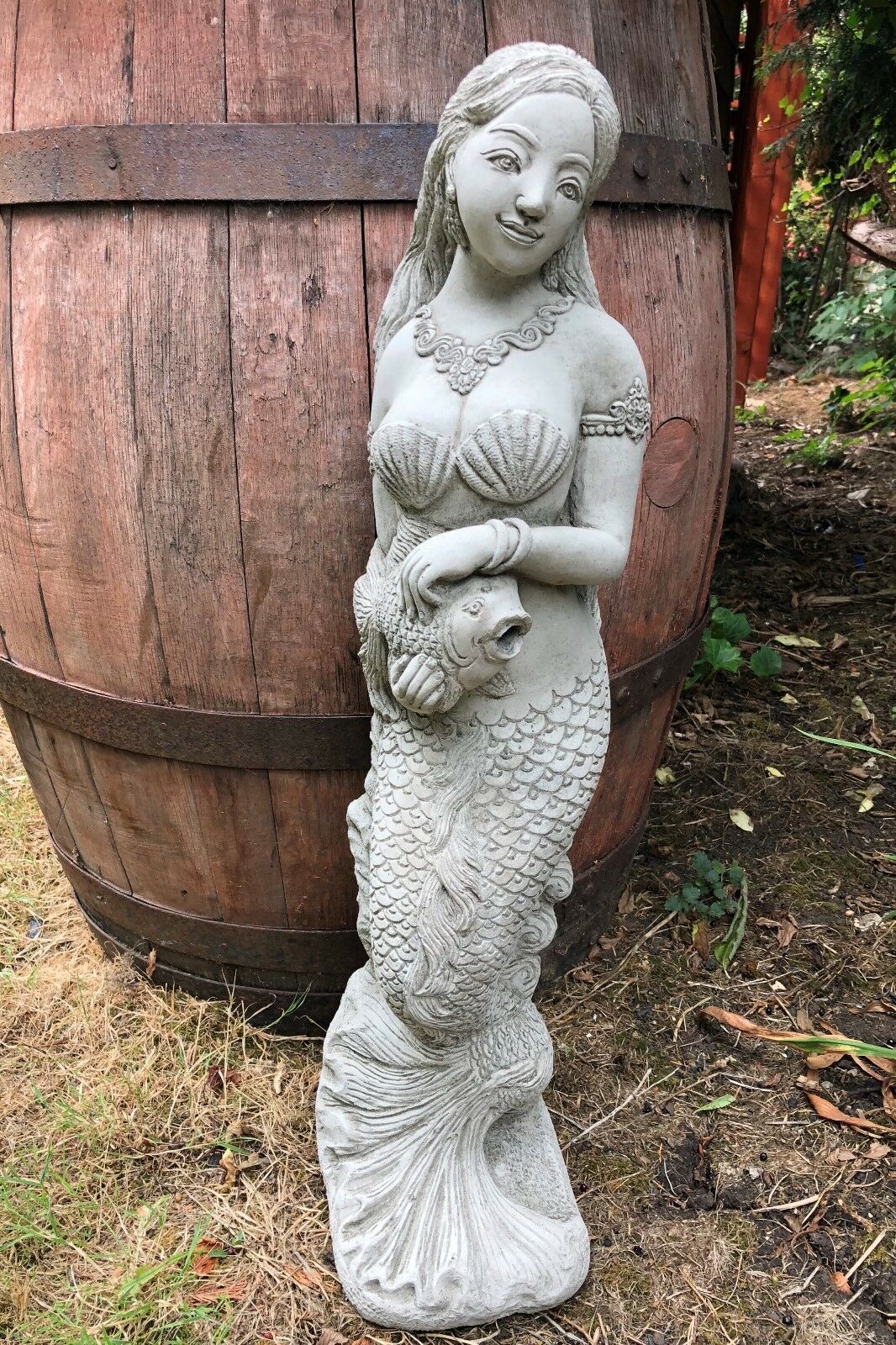 Elegant Mermaid Garden Water Feature Ornament in antique-finished stone, perfect for enhancing outdoor ponds and garden landscapes.