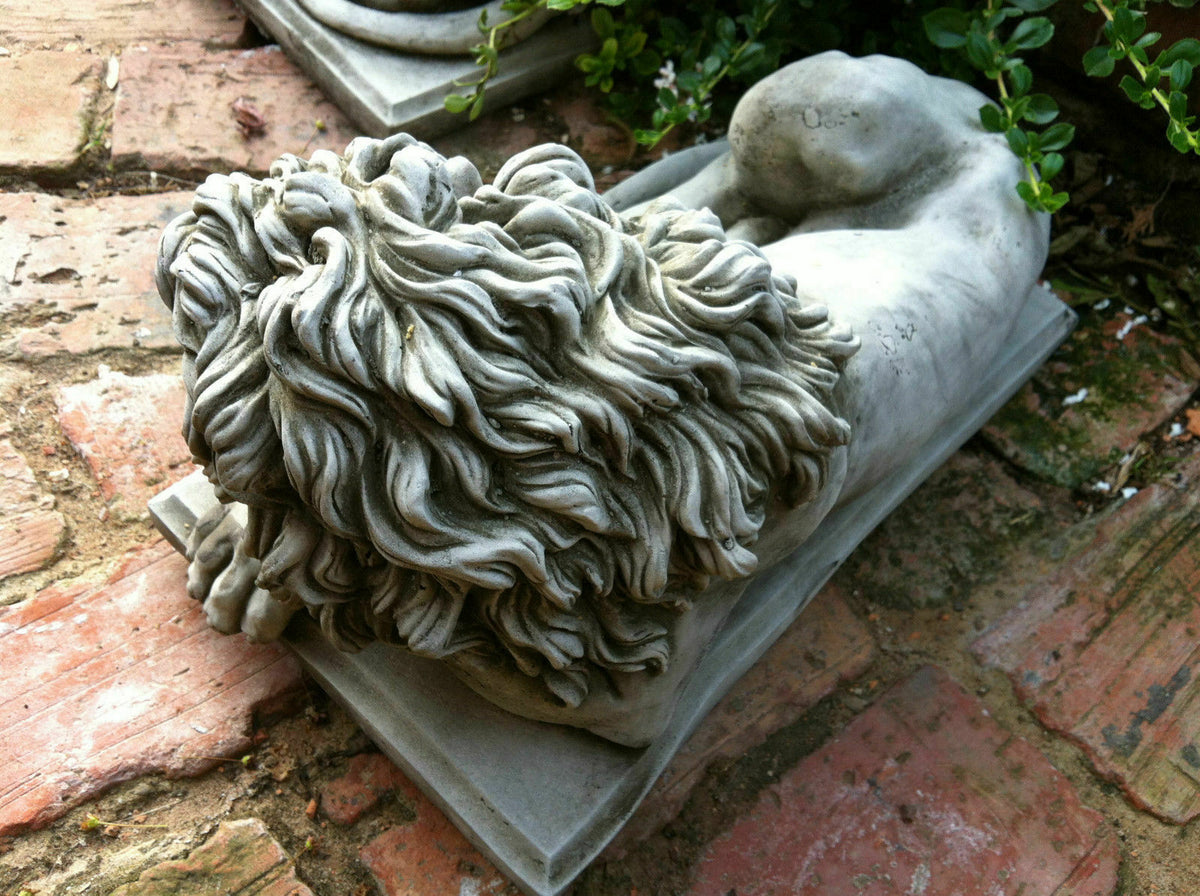 Rear view of detailed stone lion statue showing intricate mane texture, perfect for enhancing garden aesthetics with elegant animal sculptures.