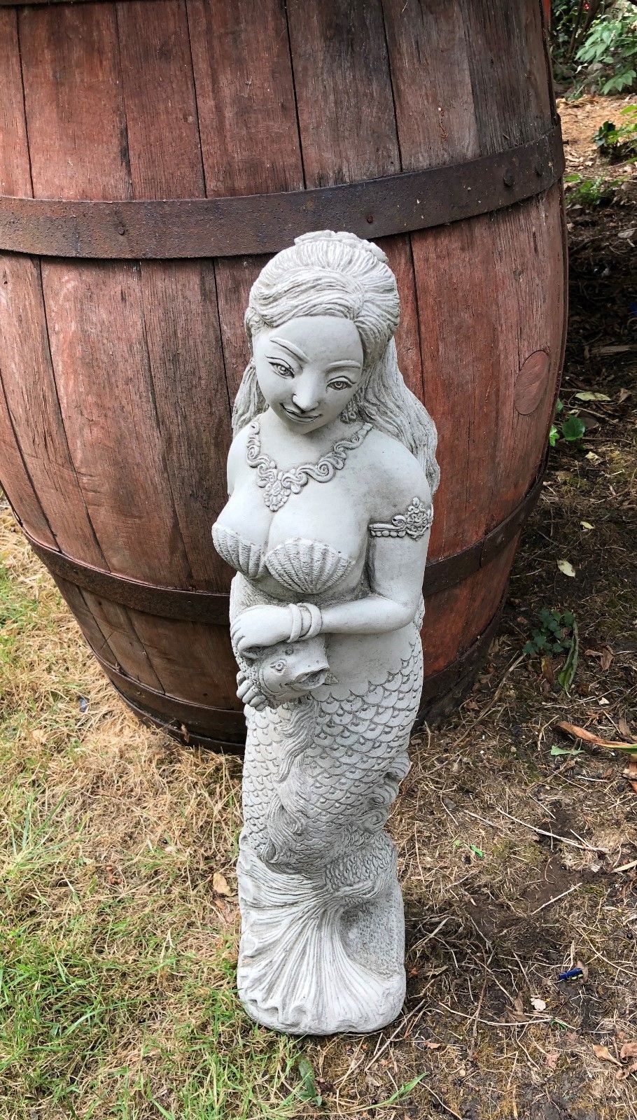 Top-down view of Mermaid Water Feature Ornament, highlighting sculpted hair and shell details for decorative garden use.