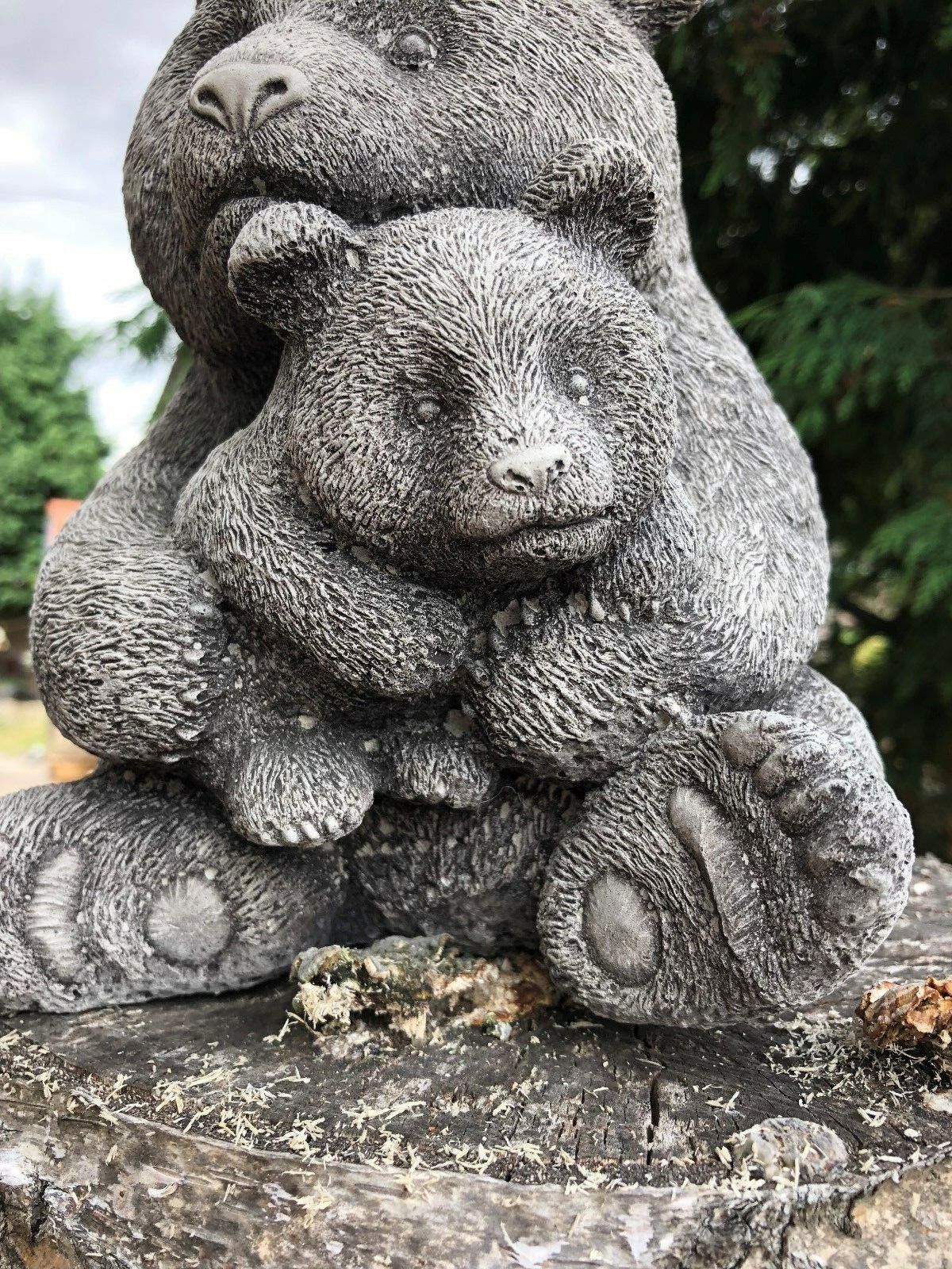 Close-up of Mother & Baby Panda Sculpture in stone, highlighting intricate fur texture and lifelike design for garden or patio display.