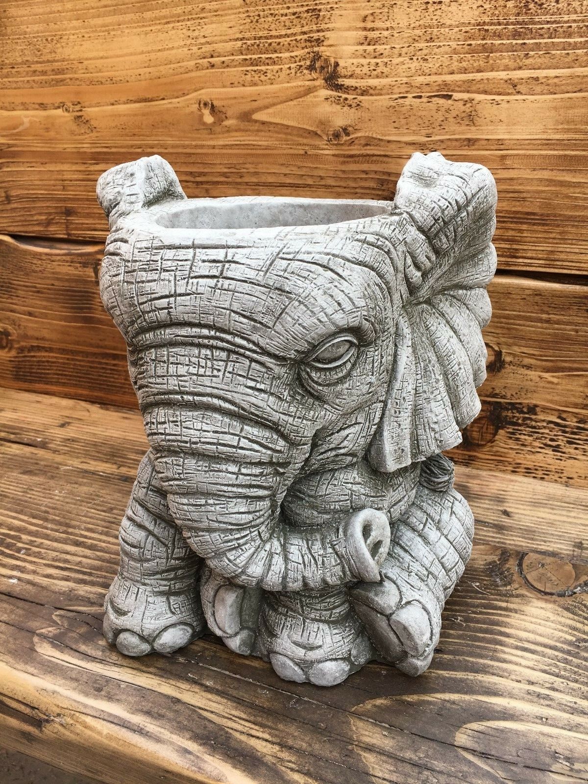 Stone Elephant Planter Design with antique grey finish, ideal as a unique outdoor garden accent. Features detailed texture and sturdy build.