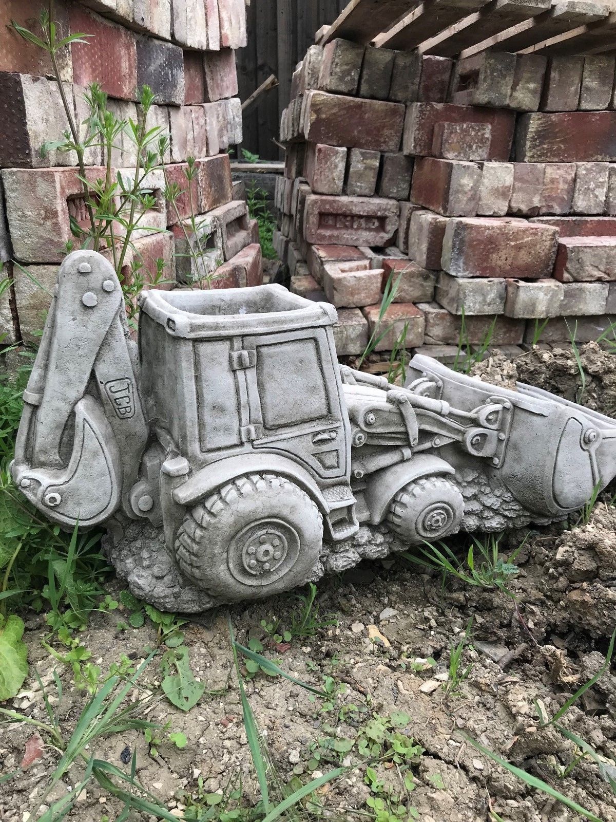 JCB Shovel Digger Planter - Garden Feature | Heavy & Durable limestone digger planter with detailed wheels and cabin, perfect for garden landscaping.