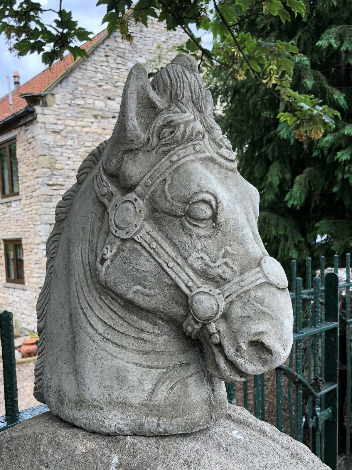 Stone Horse Head Finial-Limestone Garden Decor | Made in UK. Handcrafted limestone horse head sculpture with bridle detail, ideal for garden posts.