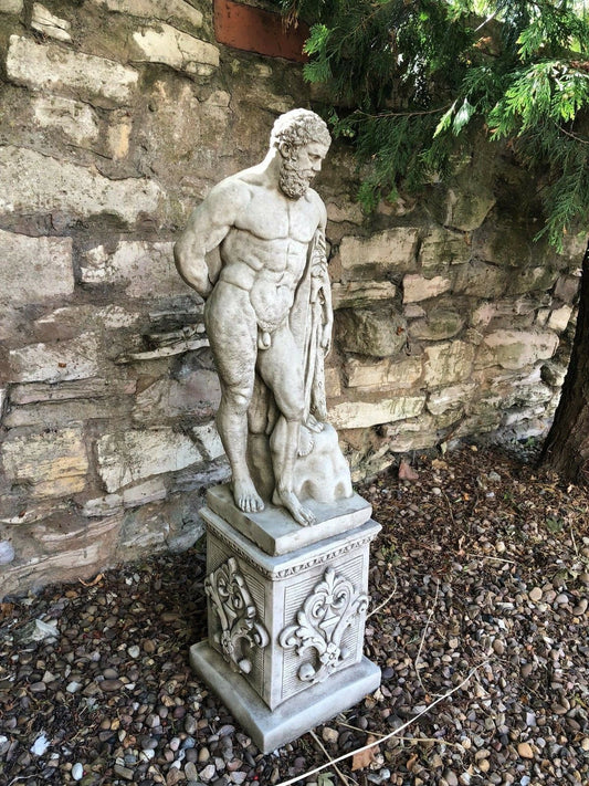 Hercules stone statue garden sculpture in limestone finish, featuring detailed lion skin and muscular form on ornate plinth.
