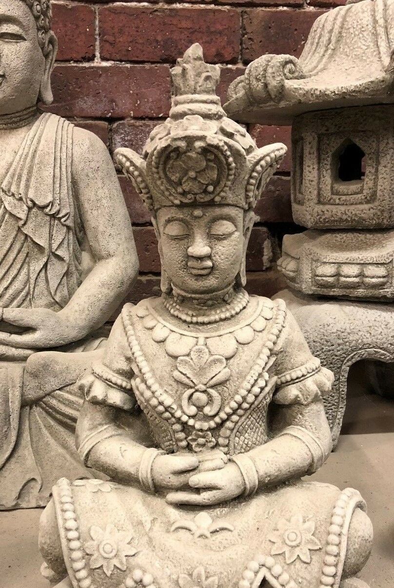 Serene Buddha Statue Garden - Meditating Stone | Peaceful Decor. Buddha statue with ornate crown and robe, perfect for enhancing garden serenity and decor.