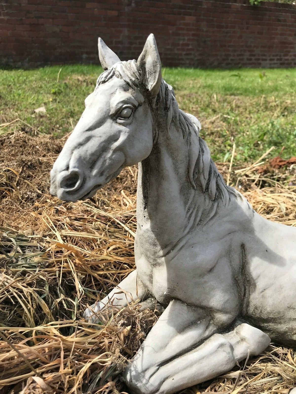 Close-up of Stone Resting Horse Statue - Garden Ornament highlighting the finely sculpted head and weather-resistant limestone texture.