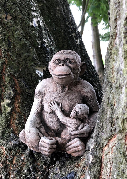 Stone Monkey Garden Ornament - Decorative Outdoor Piece featuring a mother and baby monkey nestled in a tree, ideal for garden lovers.