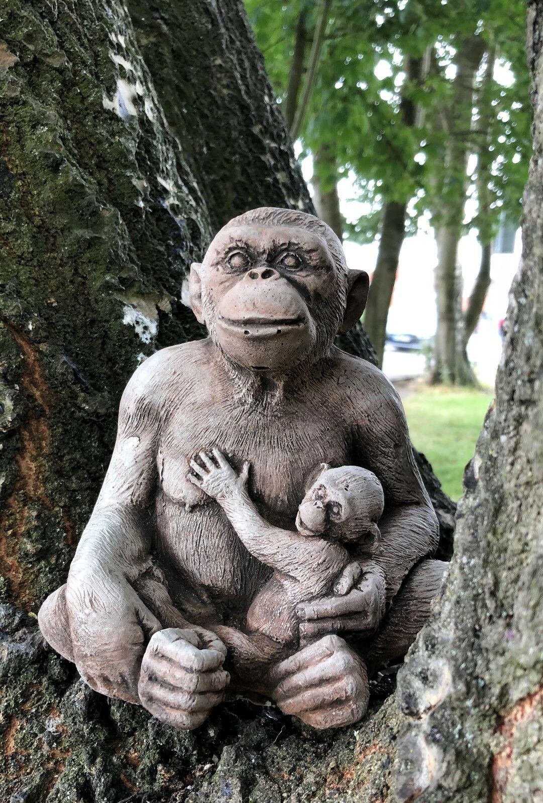 Charming Stone Monkey Garden Ornament with mum and baby design, crafted from weather-resistant limestone for outdoor garden decor.