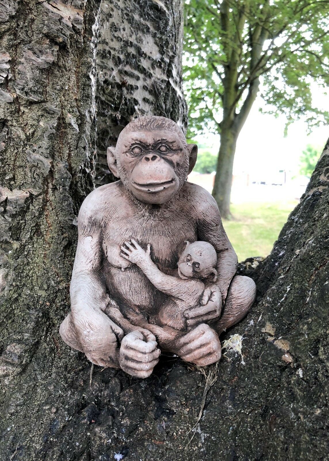 Outdoor Stone Monkey Garden Ornament with antique finish, depicting a loving mother and baby monkey pair for lawn or porch decoration.