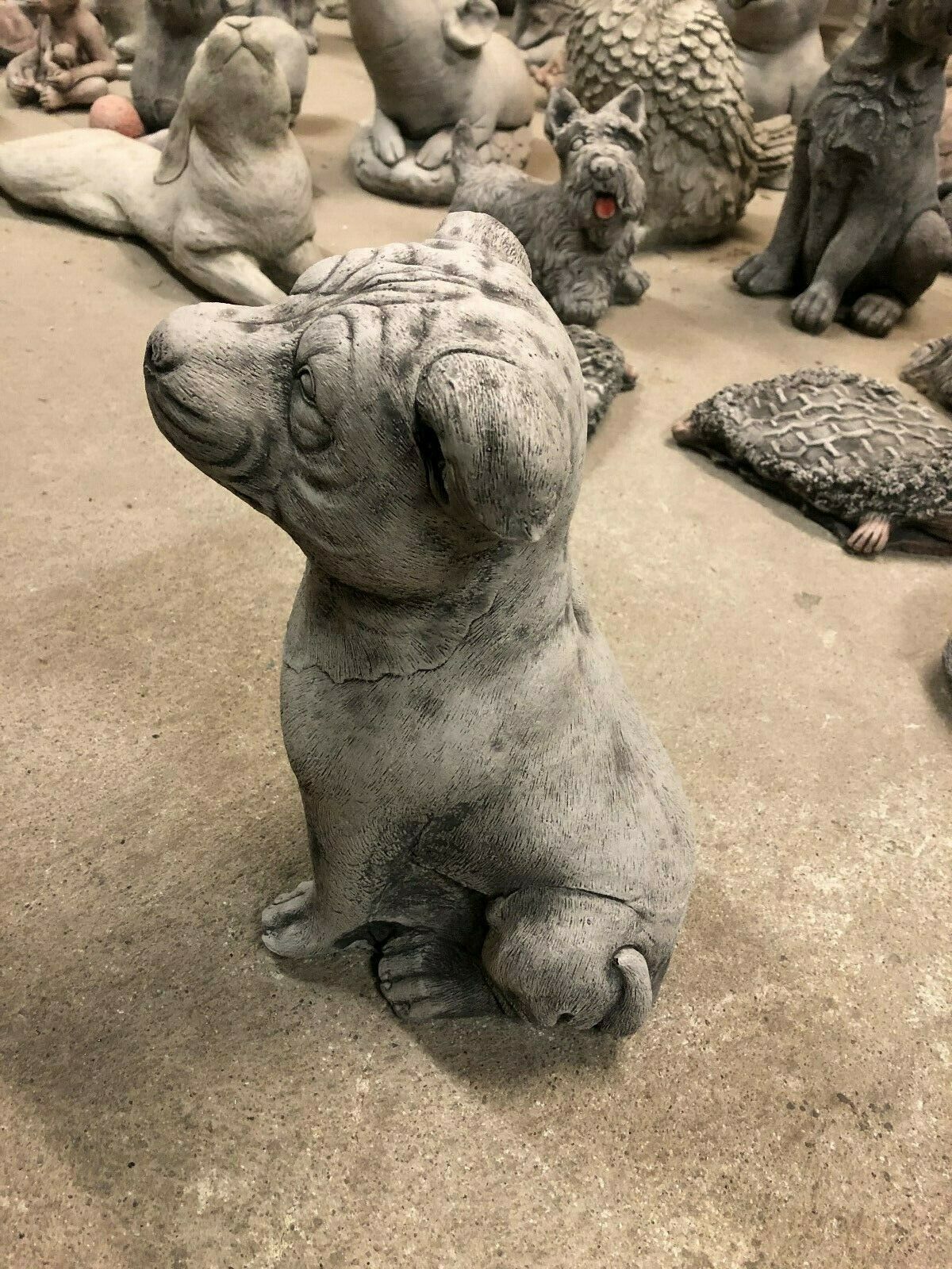 Staffordshire Bull Terrier Statue - Stone Garden Decor | UK Delivery. Side view of realistic stone terrier ornament, great for outdoor garden decoration.