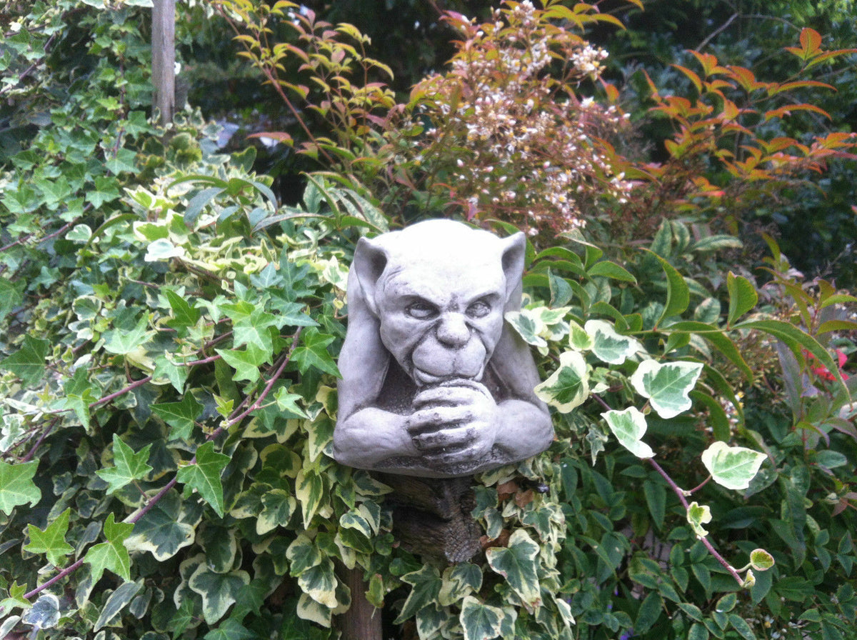 Front view of Gargoyle Garden Ornament in antique stone finish. Ideal gothic sculpture for garden or patio wall decoration.
