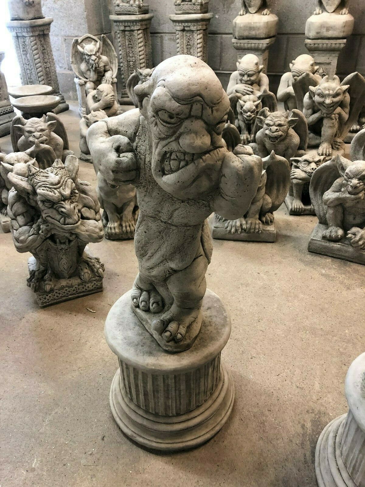 Stone Bare Knuckle Boxer Garden Statue with clenched fists and fierce expression, perfect for lawn or patio ornamentation.