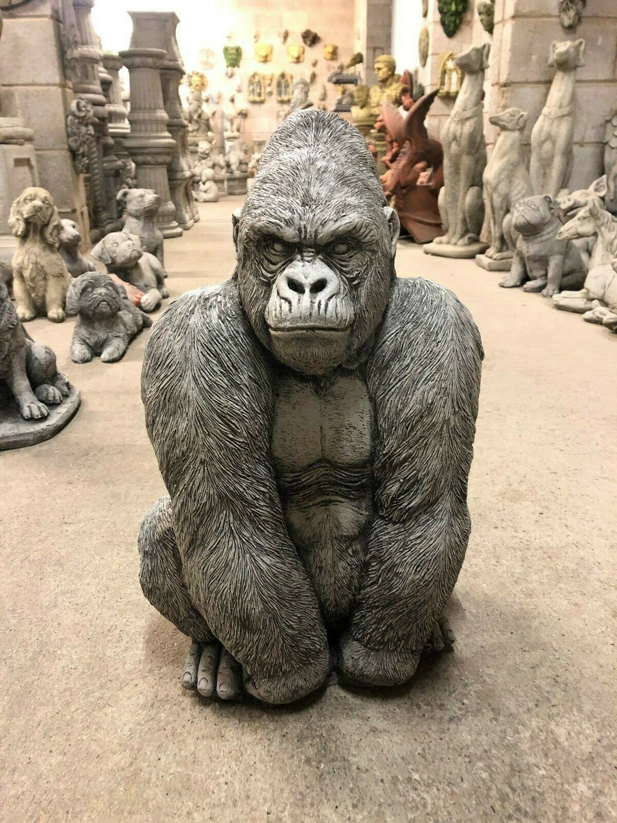 Gorilla Statue - Stone Silverback Ornament in limestone finish, front view showing detailed fur texture and muscular build for garden decor.