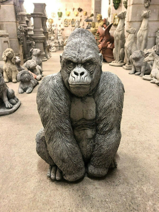 Gorilla Statue - Stone Silverback Ornament in limestone finish, front view showing detailed fur texture and muscular build for garden decor.