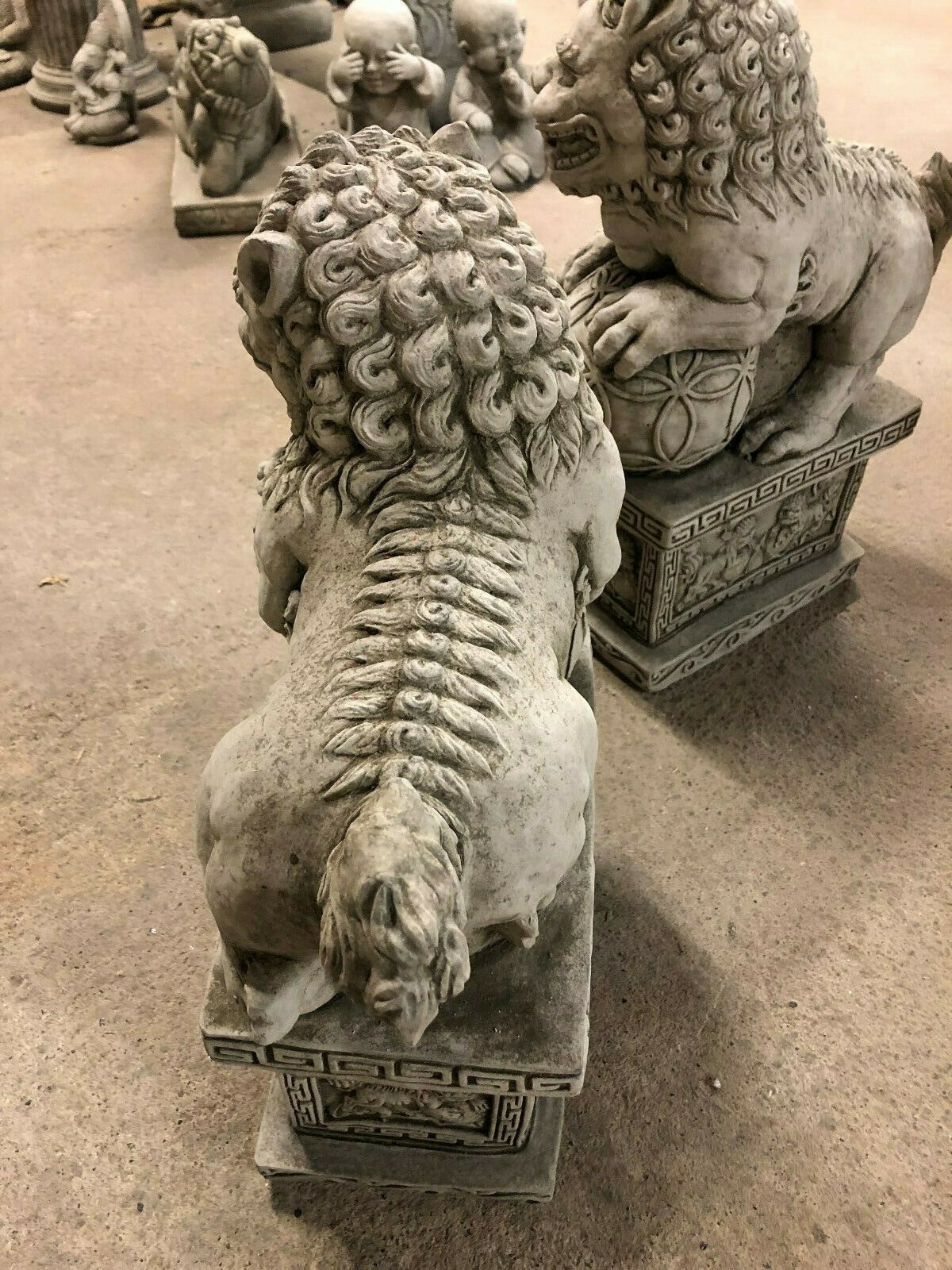 Rear view of Foo Dog Statues showing detailed mane and tail carvings, demonstrating full 360-degree craftsmanship.
