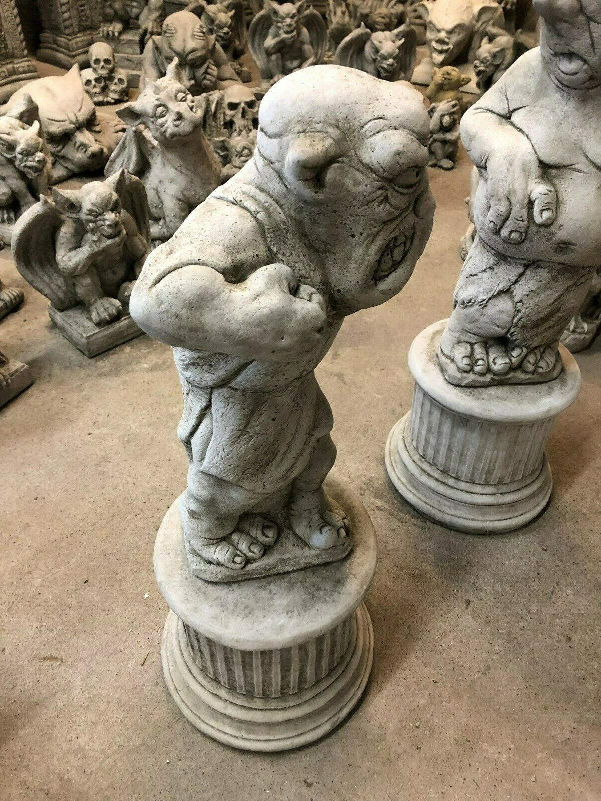 Side view of aggressive stone boxer statue with detailed muscle definition, part of Bare Knuckle Boxer Statues - Garden Ornaments collection.