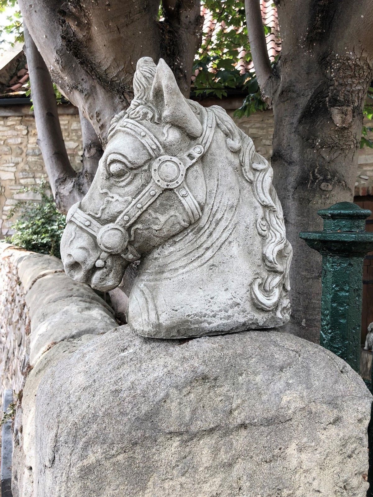 Stone Horse Head Finial-Limestone Garden Decor | Made in UK. Weathered limestone horse bust finial with flowing mane, ideal for rustic garden decor.
