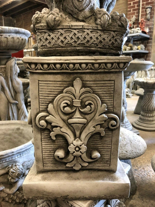 Square plinth stone design with intricate floral carvings, ideal for garden statues or ornaments. Solid limestone base for outdoor durability.