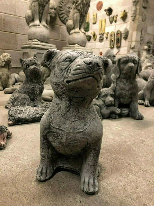 Staffordshire Bull Terrier Statue - Stone Garden Decor | UK Delivery. Detailed stone dog sculpture ideal for outdoor garden ornament or patio display.